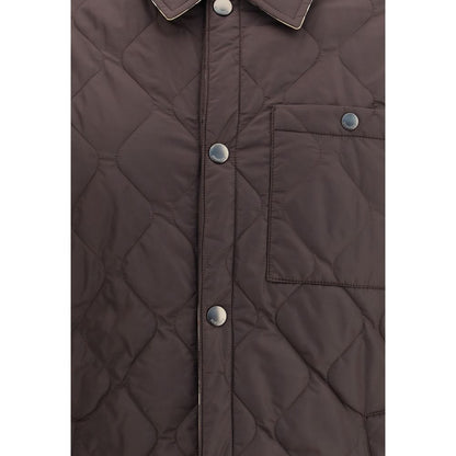 Burberry Brown Polyamide Coat featuring quilted nylon, snap button closure, and chest pocket for a stylish and functional outerwear.