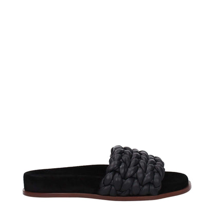 Chloé Black Leather Slippers with open toe and low flat heel, featuring a leather sole, designed for casual wear.