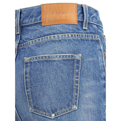 Close-up of Chloé Blue Cotton Flared Jeans with detailed stitching and tan leather patch on the back waistband.