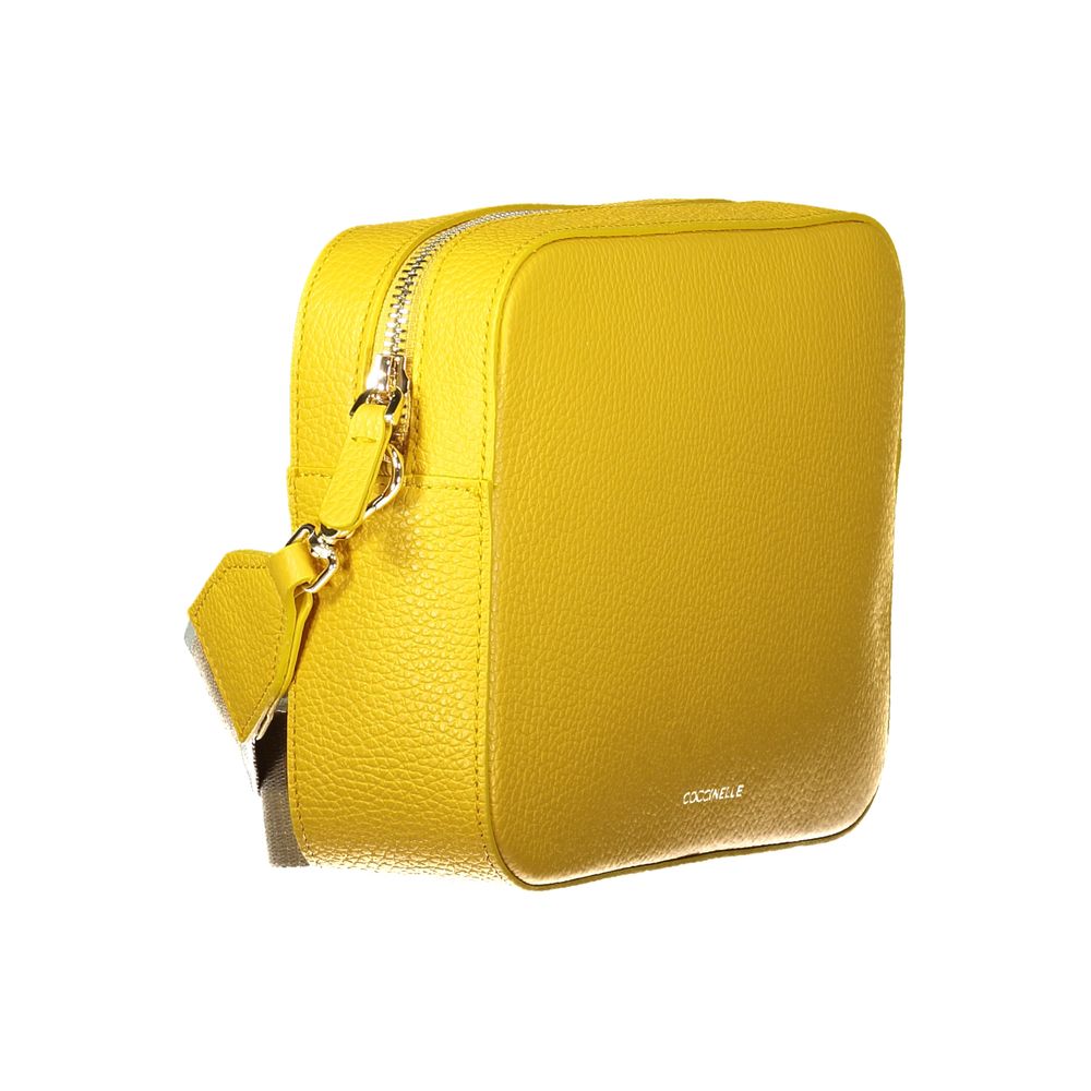 Coccinelle Yellow Leather Women Handbag with adjustable strap and zip closure, showcasing a luxurious and trendy design.