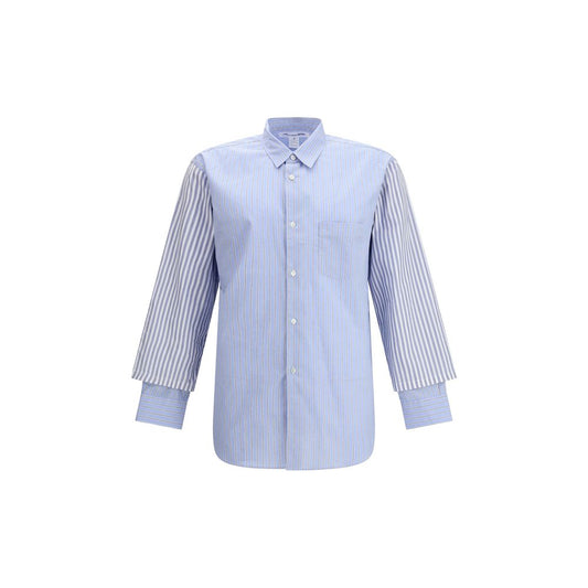 Comme Des Garçons Light Blue Cotton Pattern Shirt with subtle stripes and double cuffs for a sophisticated and contemporary look.