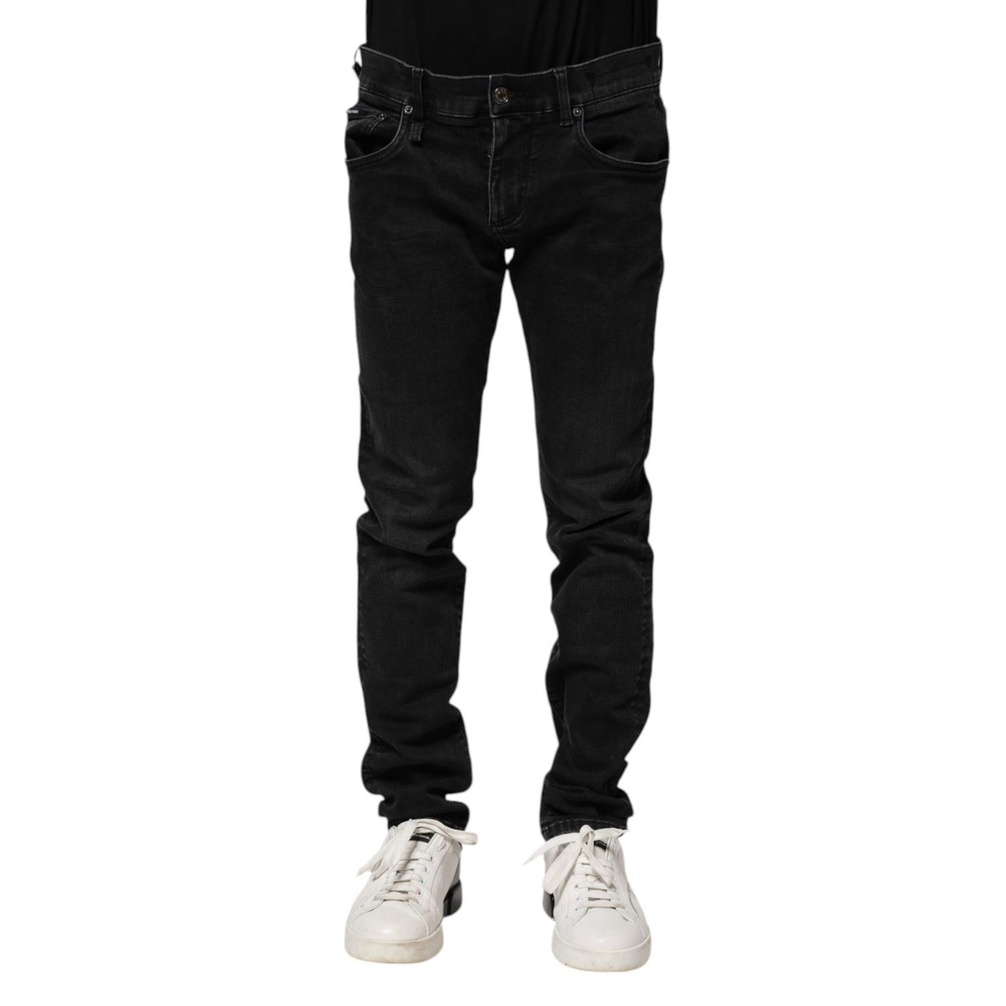 Dolce & Gabbana Black Cotton Skinny Men Denim Jeans, made in Italy, featuring a regular fit and exclusive craftsmanship with logo details.