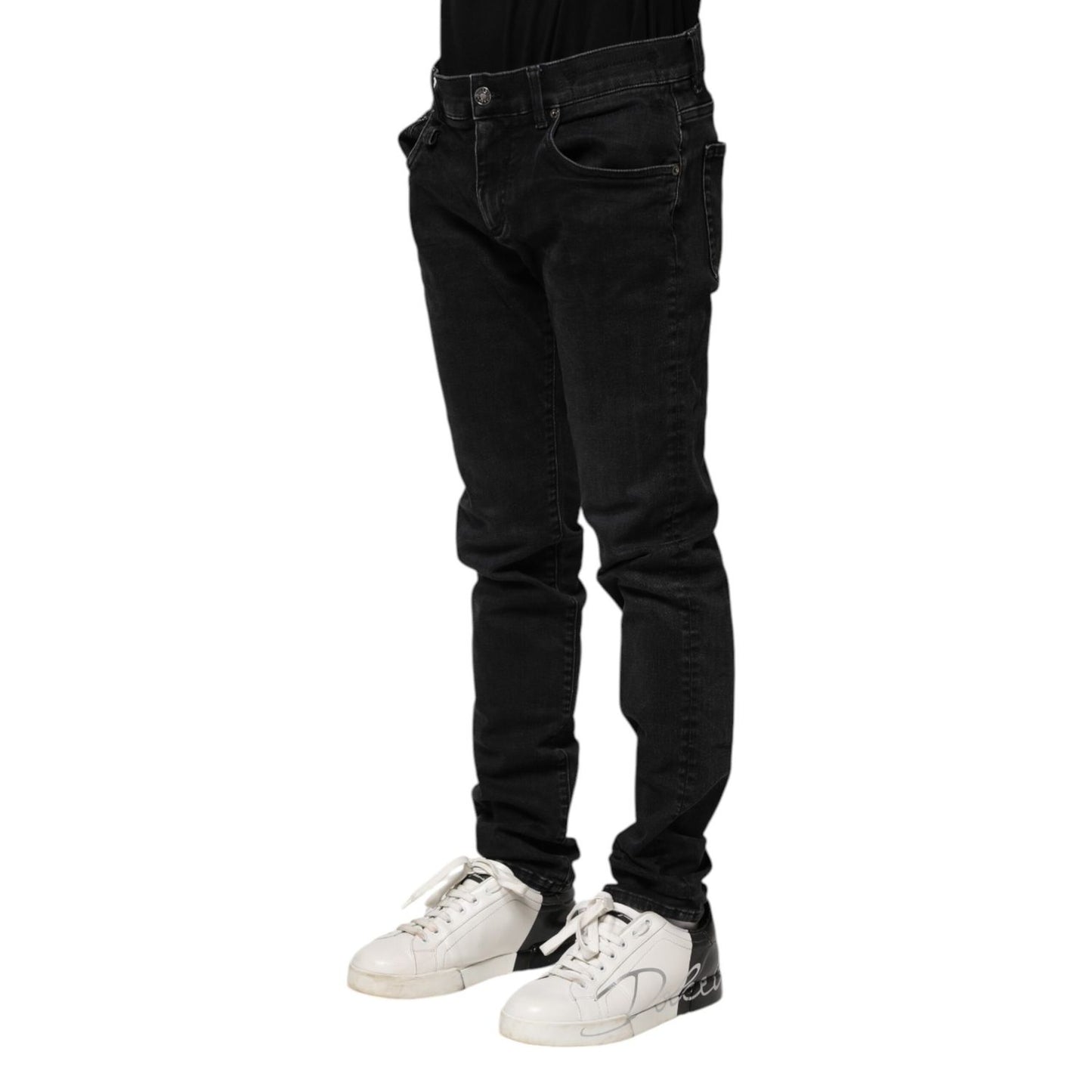 Dolce & Gabbana Black Cotton Skinny Men Denim Jeans, made in Italy, featuring zipper and button closure, perfect for exclusive style.