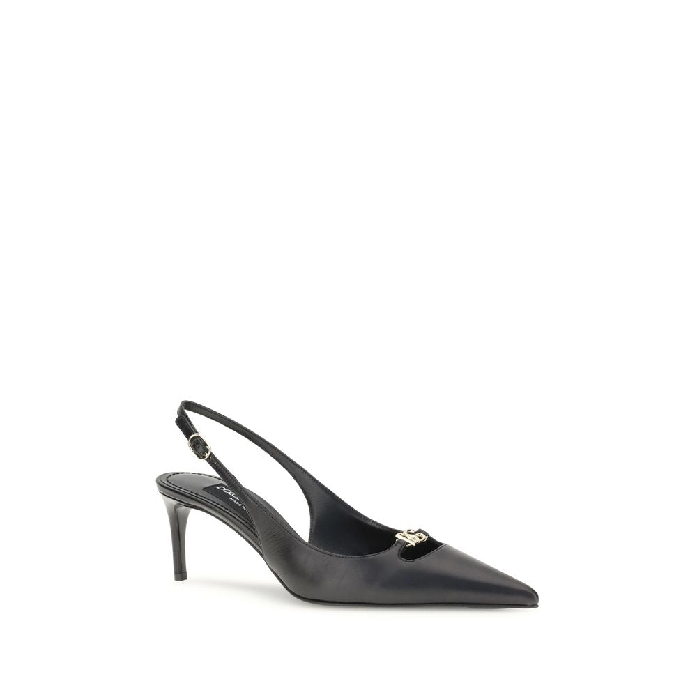 Dolce & Gabbana Black Goatskin High Heel Pumps with gold logo, tapered toe, and adjustable strap.