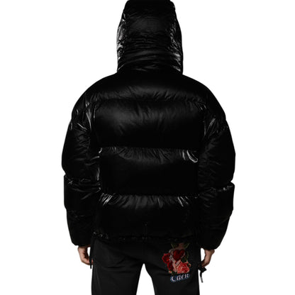 Dolce & Gabbana Black Logo Full Zip Hooded Quilted Jacket, back view, showcasing shiny black nylon material, luxury fashion, Made in Italy.