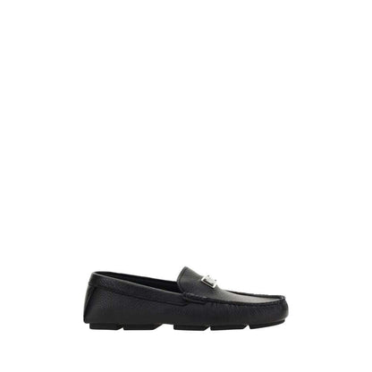 Dolce & Gabbana Black Rubber Slip-On Loafers with calfskin leather and metal monogram plaque, non-slip sole, luxury fashion footwear