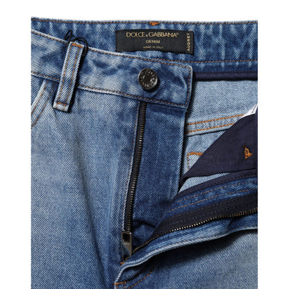 Close-up of Dolce & Gabbana Blue Washed Skinny High Waist Denim Jeans with zipper and button detail, made in Italy.