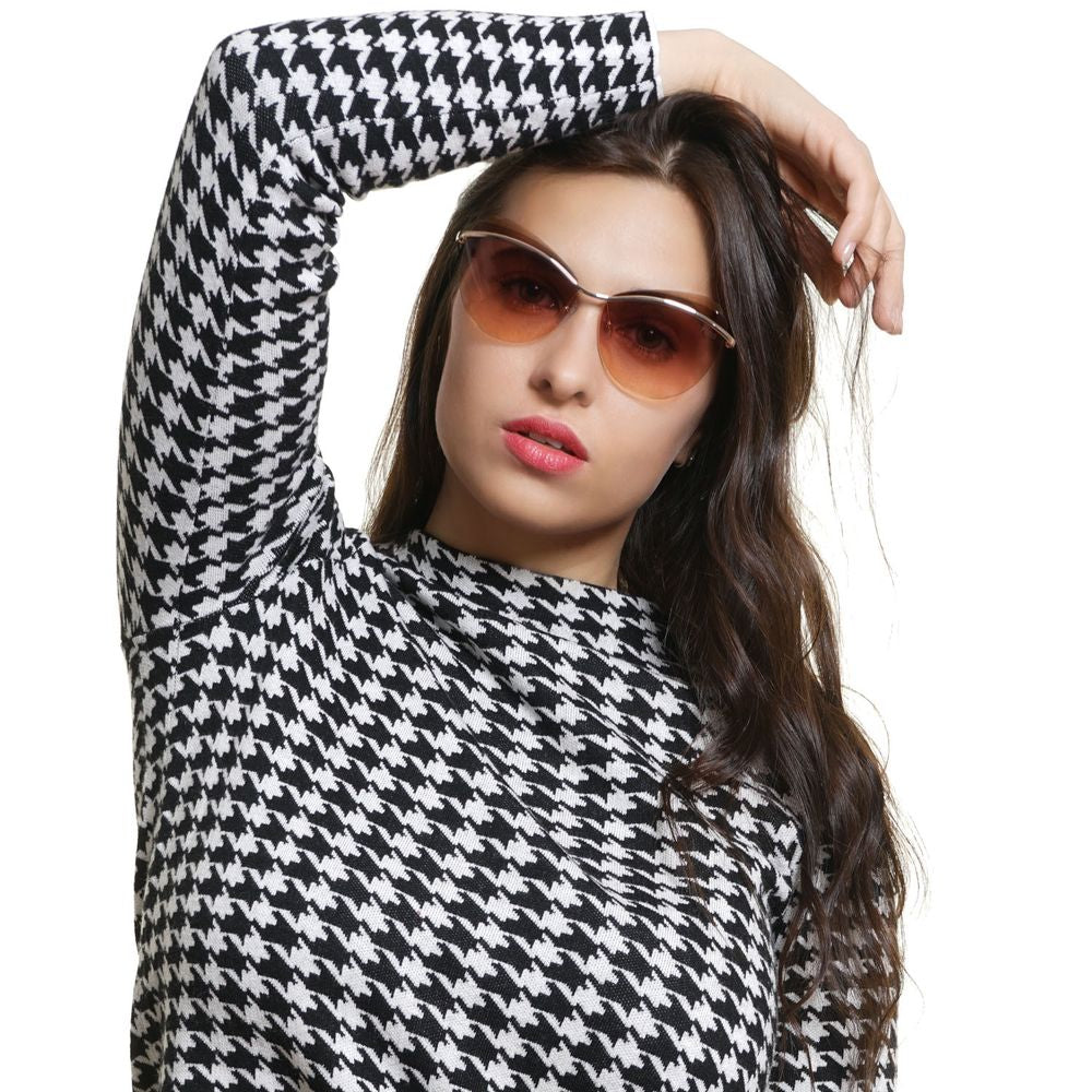 Woman wearing Emilio Pucci Gold Metal & Plastic Sunglasses with rose gradient lenses in cat eye style.