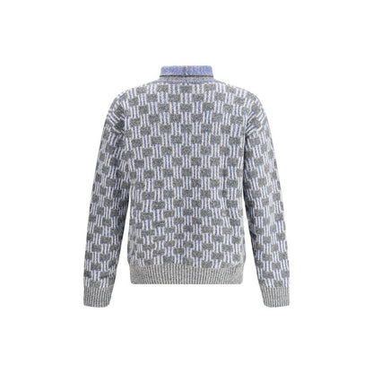 Giorgio Armani Light Blue Cotton Turtleneck with two-tone graphic pattern, fine knit from cotton, alpaca wool, and cashmere blend.