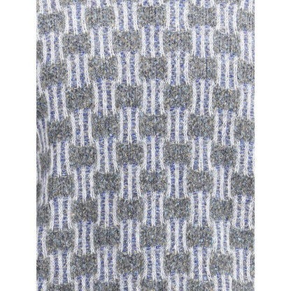 Close-up of Giorgio Armani Light Blue Cotton Turtleneck fabric texture showing two-tone graphic pattern and refined knit details.