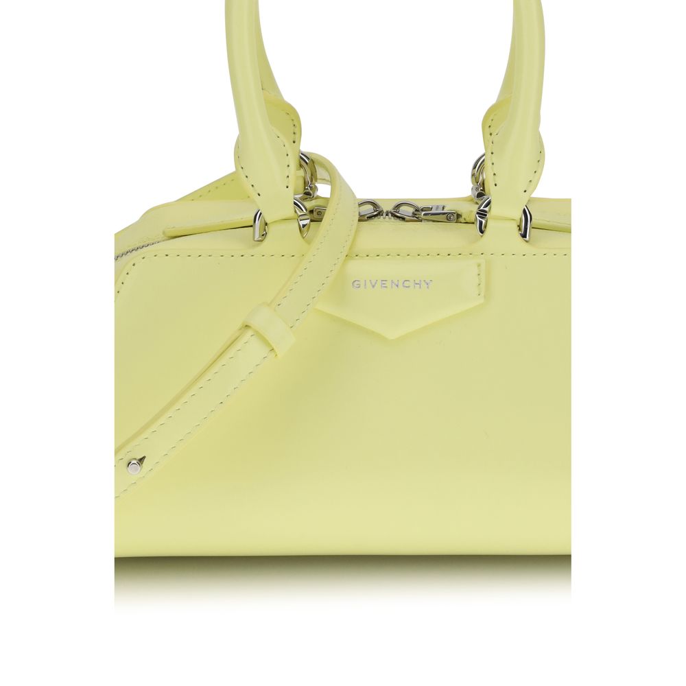 Givenchy Yellow Calf Leather Bos Taurus Handbag - Antigona East-West Mini with embossed signature and removable shoulder strap.