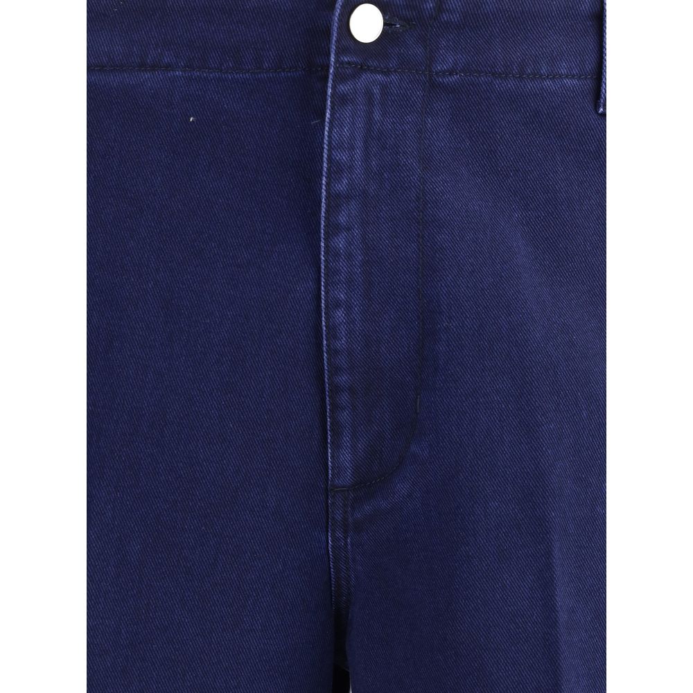 Gucci Blue Cotton Jeans Denim with button closure and tailored fit, featuring embroidered logo and straight hem, made of 100% cotton.