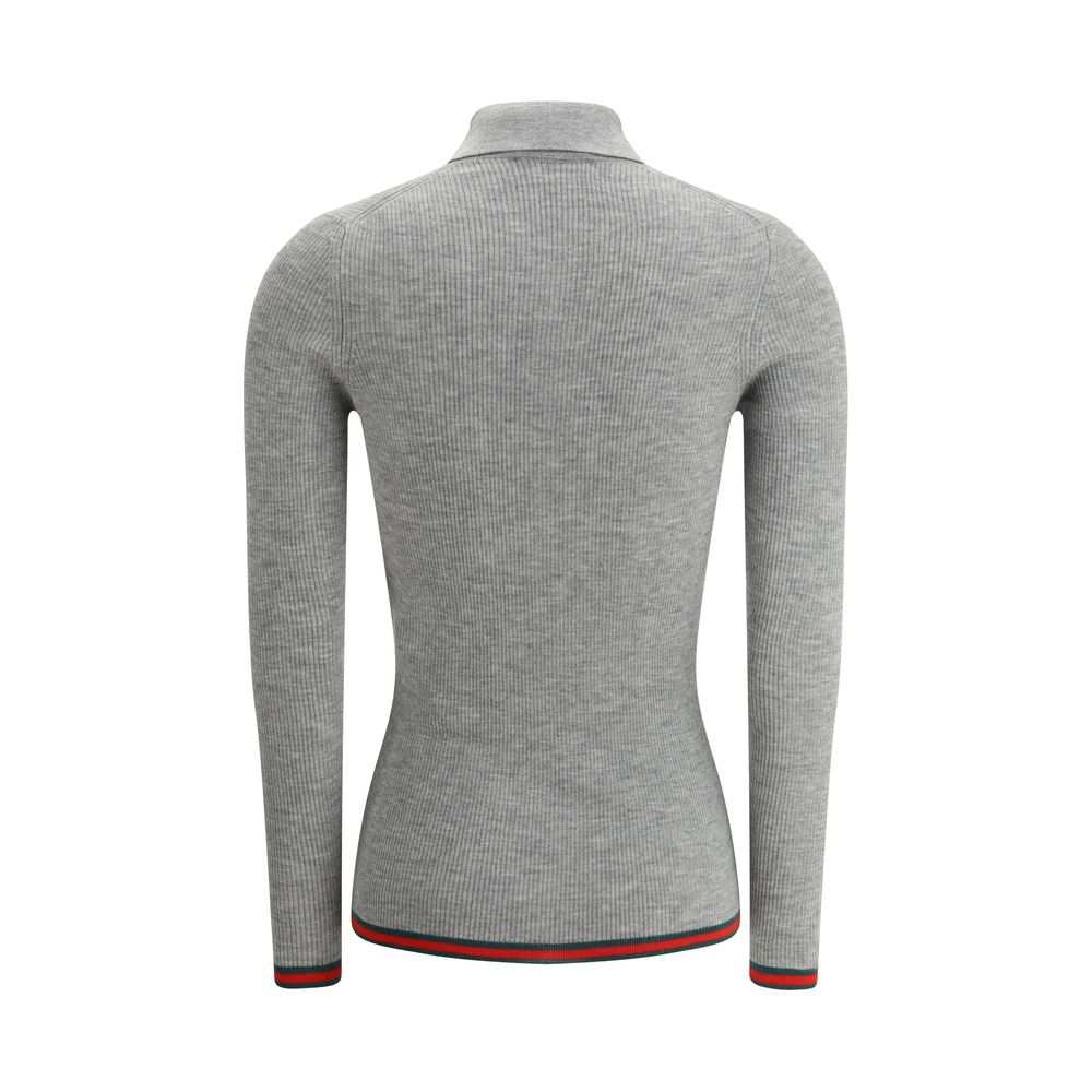 Back view of Gucci Gray Cashmere Top with ribbed design and iconic colored bands on hem and cuffs.