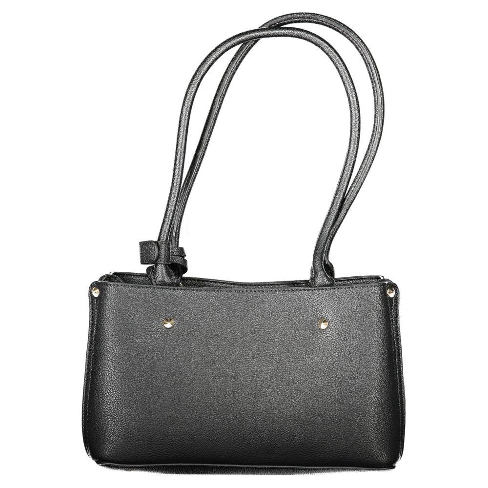 Front view with bag zipped and handles upright.