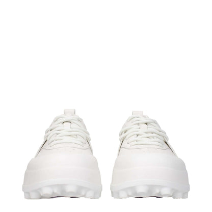 Jil Sander White Leather Sneakers with lace-up design and rubber sole, side logo visible, sporty glam style, round toe mid heel shoes.