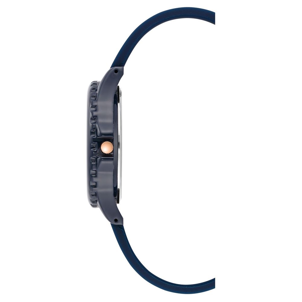 Side view of Juicy Couture Blue Synthetic Dress Watch with blue silicone bracelet and metal case.