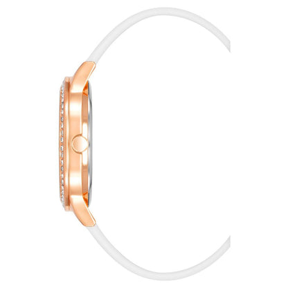 Side view of Juicy Couture White Synthetic Dress Watch with pink metal case and white silicone bracelet