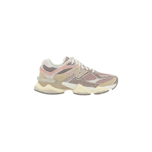 New Balance Sneakers 9060Sneakers 9060 by New Balance combine performance and contemporary style. The mesh upper, enhanced with suede details, ensures breathability and comfort, while the front lace-up closure provides a secure fit. An elongated toe box a