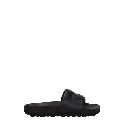 Off-White Black Leather Slippers with open toe and rubber sole, featuring front logo and casual design.