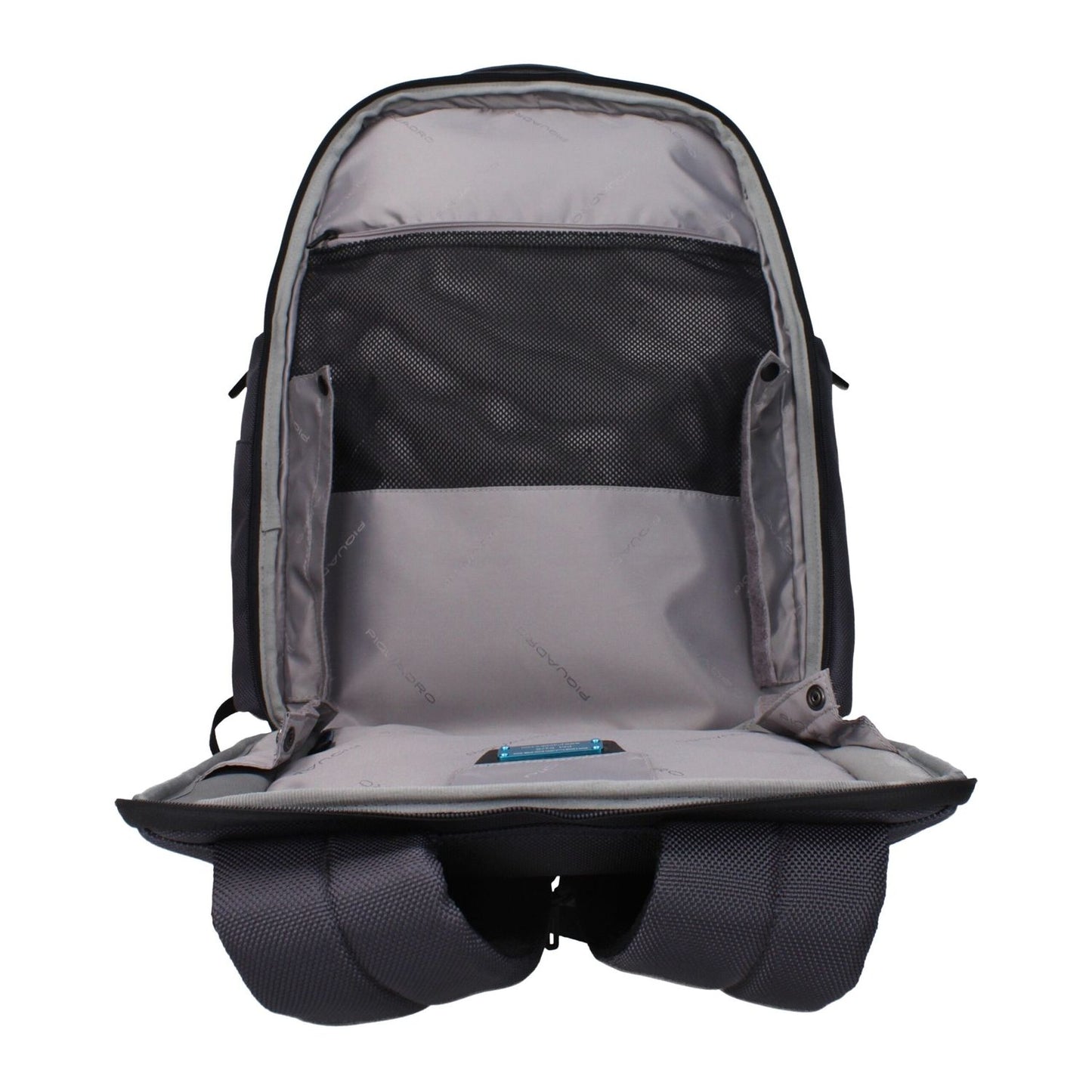 Interior view of Piquadro Gray Nylon Backpack with compartments, iPad/PC case, and adjustable straps, showing its organizational features.