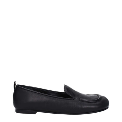 Premiata Black Leather Slip-On Loafers with back logo, round toe, and low flat heel.