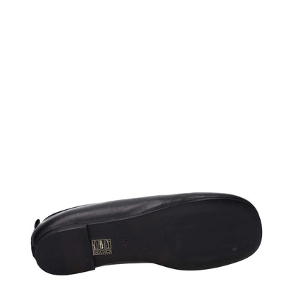 Premiata Black Leather Slip-On Loafers with leather sole and logo, featuring round toe and low flat heel. MPN: PELLEM6705NERO.