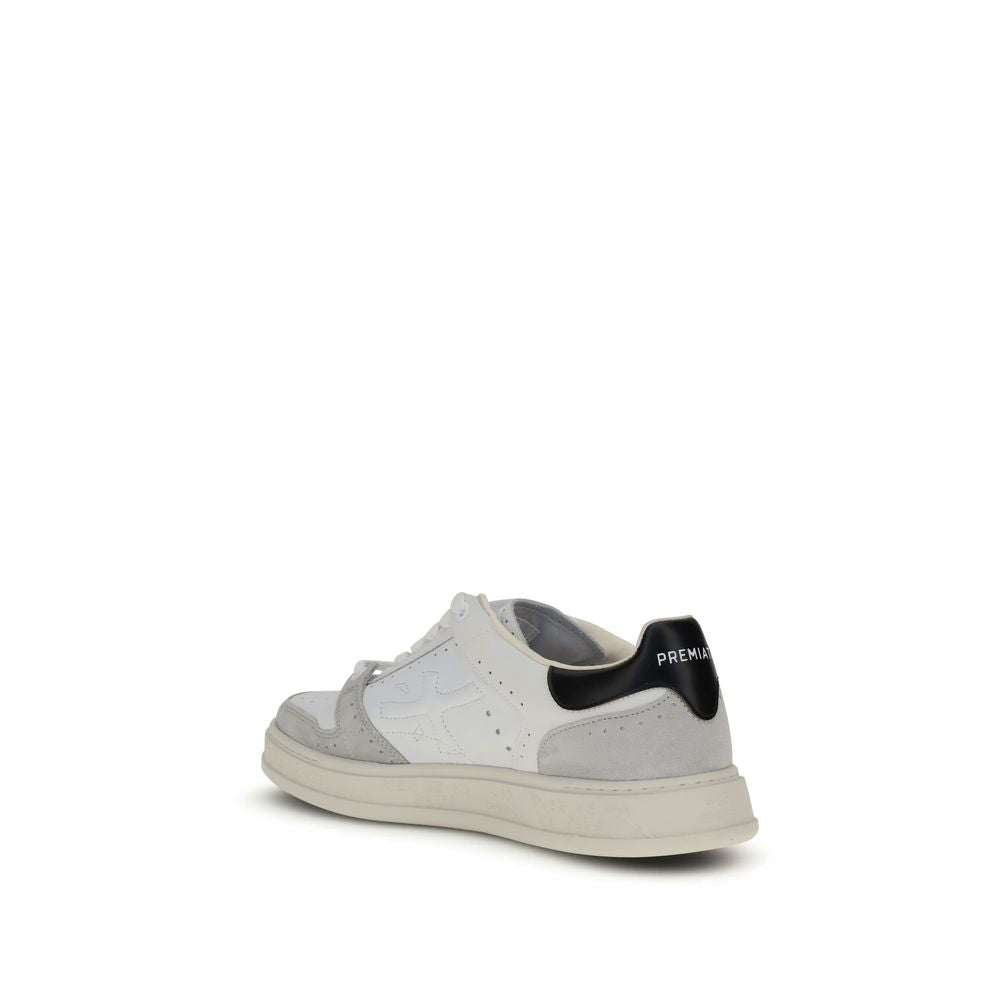 Premiata White Calf Leather Bos Taurus Low Top Sneakers with logo embossed heel and perforated toe design.