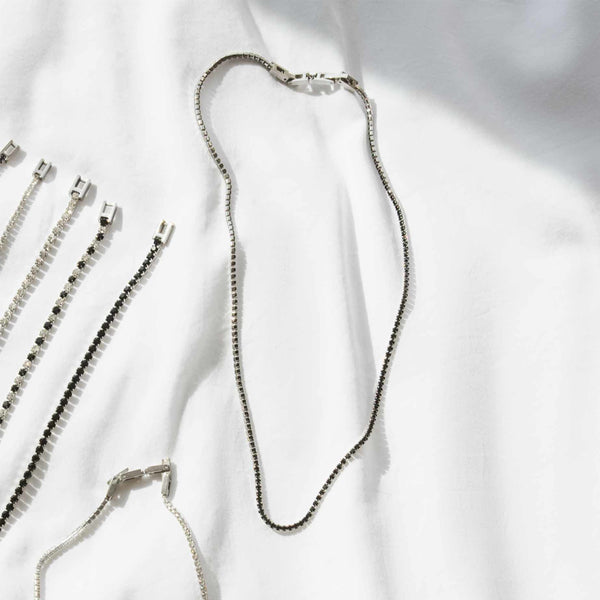 RADIANT JEWELS JEWELRY Mod. RH000016 silver necklaces displayed on white fabric background