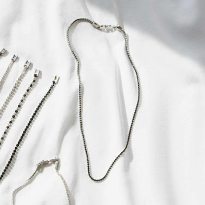 RADIANT JEWELS JEWELRY Mod. RH000016 silver necklaces displayed on white fabric background