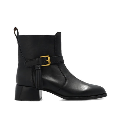 See By Chloé Black Calfskin Ankle Boots with leather lining, rubber sole, side zip, adjustable strap. Made in Spain.