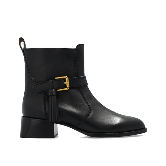 See By Chloé Black Calfskin Ankle Boots with leather lining, rubber sole, side zip, adjustable strap. Made in Spain.