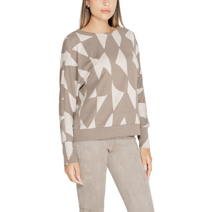 Model wearing Street One Brown Polyester Sweatshirt with geometric print and crew neckline, showcasing modern and comfortable design.