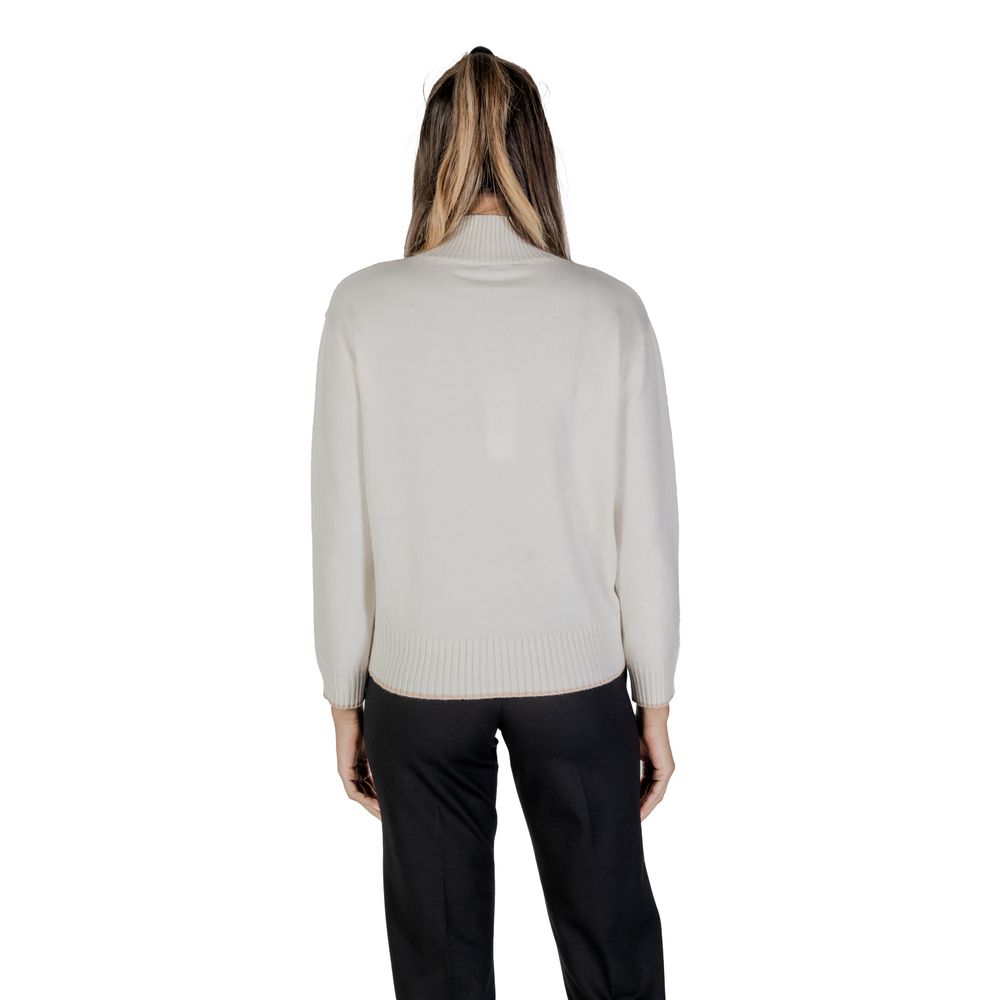 Back view of woman wearing Street One Cream Polyester Sweatshirt with ribbed hem and high neckline for comfort and style.