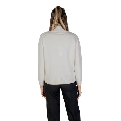 Back view of woman wearing Street One Cream Polyester Sweatshirt with ribbed hem and high neckline for comfort and style.