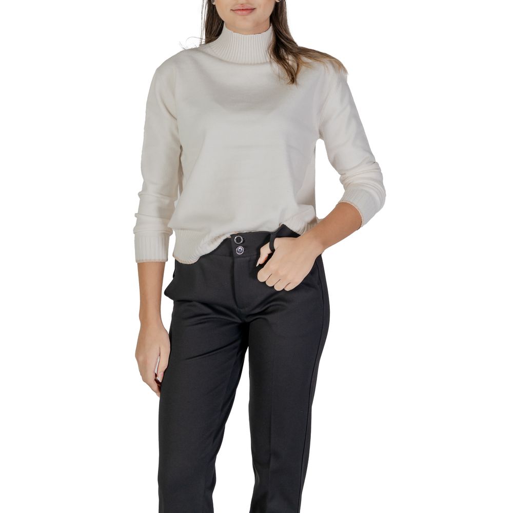 Woman wearing Street One Cream Polyester Sweatshirt with high neckline and ribbed hem for cozy, stylish look.