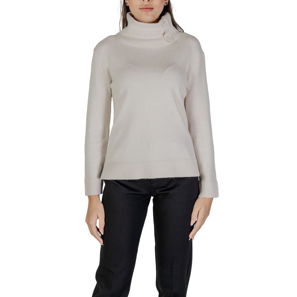 Woman wearing Street One Cream Viscose Turtleneck with stylish side buttons, ideal for cooler days.