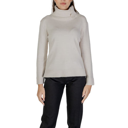 Woman wearing Street One Cream Viscose Turtleneck with stylish side buttons, ideal for cooler days.