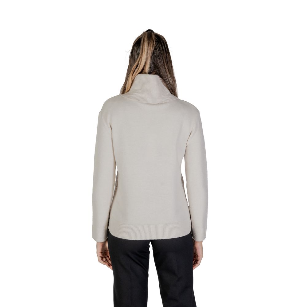 Back view of Street One Cream Viscose Turtleneck with high neck and long sleeves, showcasing soft knit fabric and stylish side buttons.