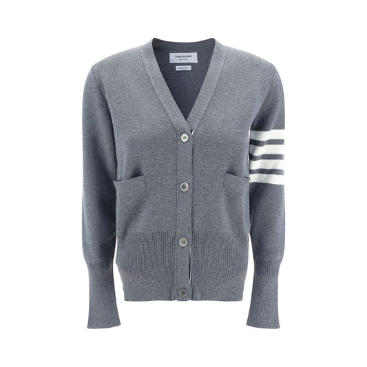 Alt Tag: Thom Browne Gray Fleece Wool Cardigan with contrasting buttons, open front pockets, V-neck, and brand bands on arm.