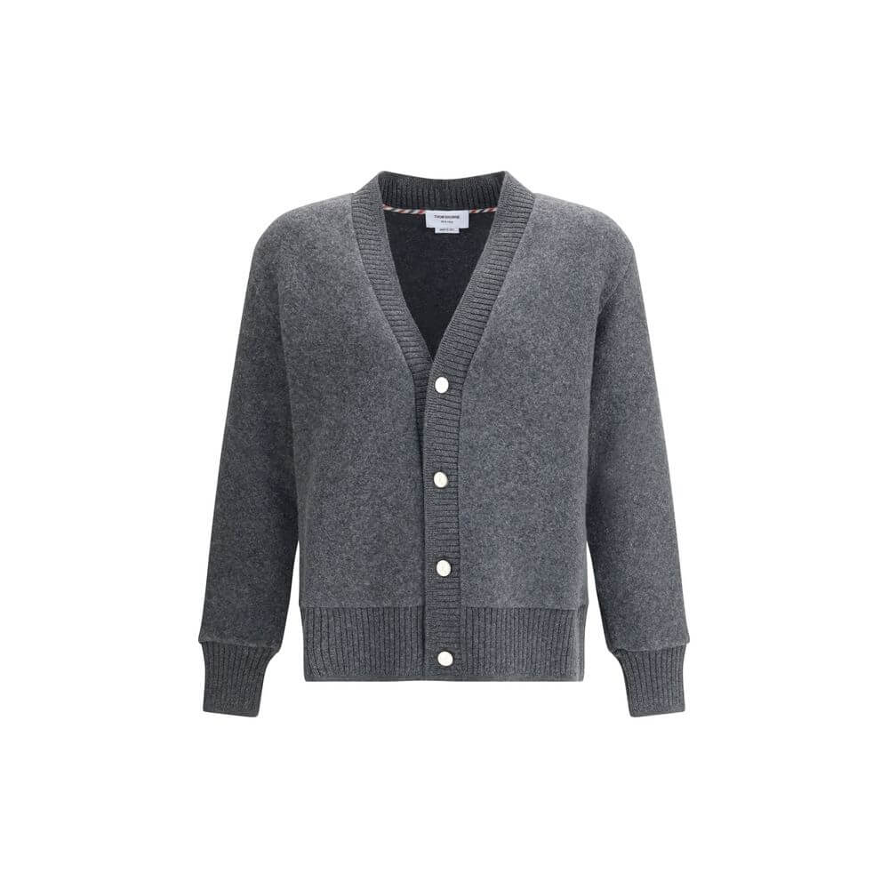 Thom Browne Gray Wool Cardigan with v-neck, button closure, and ribbed cuffs and hem. 100% wool, ideal for a sophisticated touch to your wardrobe.