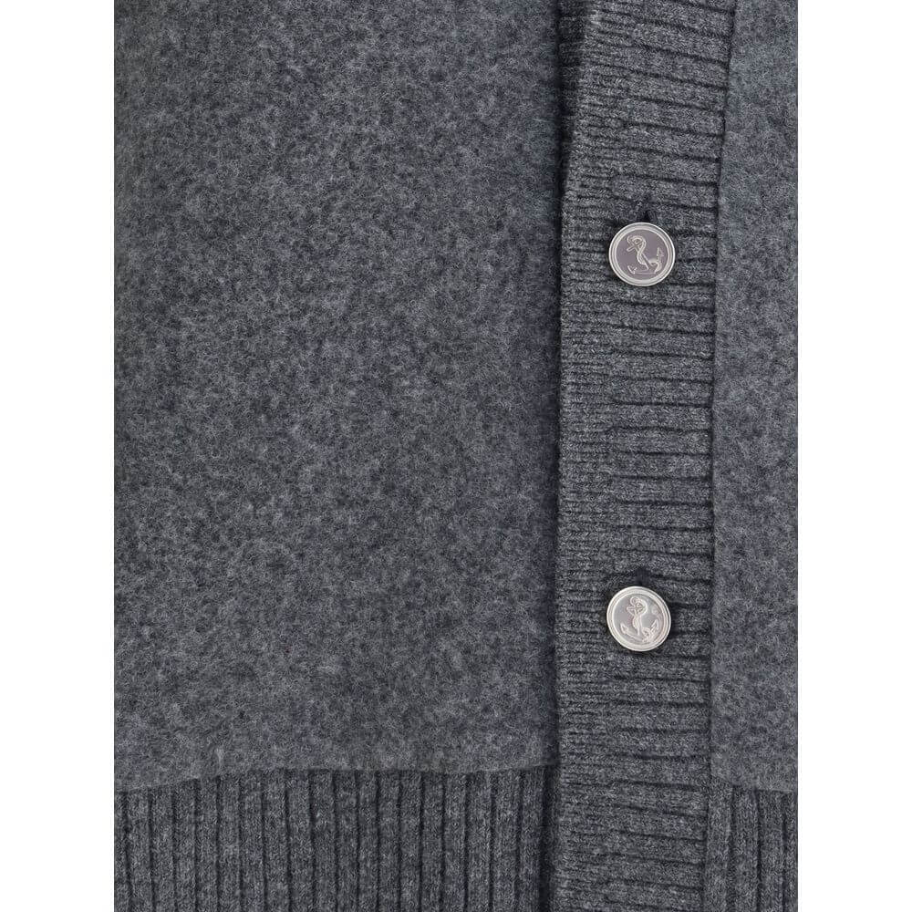 Close-up of Thom Browne Gray Wool Cardigan showing button detail and ribbed texture, highlighting its quality and stylish design.