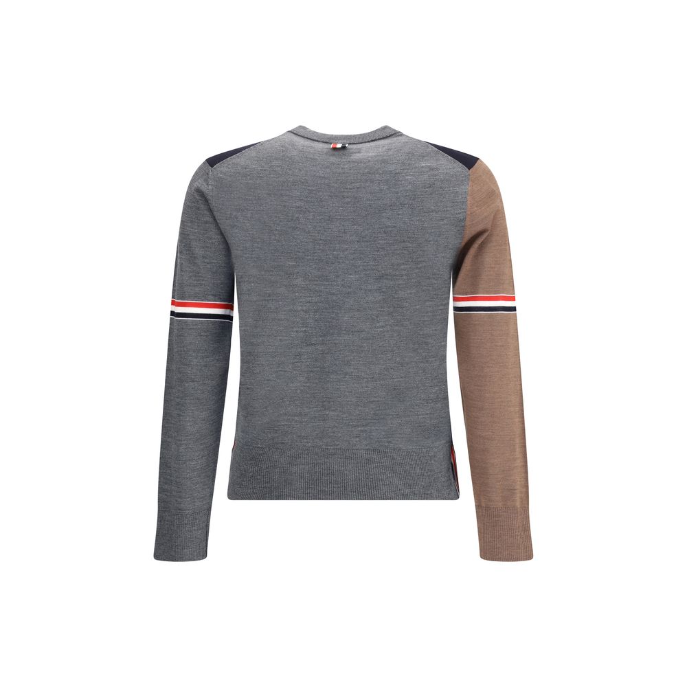 Back view of Thom Browne Multicolor Fleece Wool Sweatshirt featuring tricolor banded sleeves on grey and brown fabric.