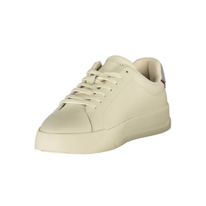Tommy Hilfiger Beige Leather Men Sneaker with sleek design and grey accents for modern style.