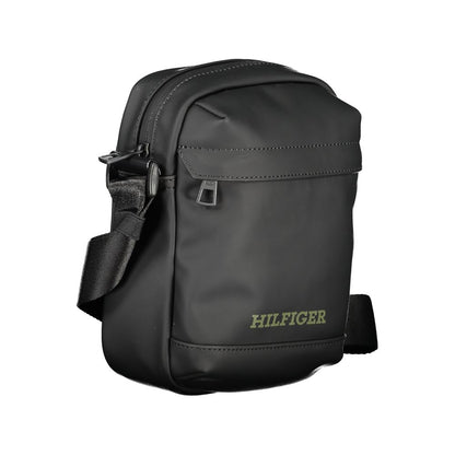 Tommy Hilfiger Black Polyethylene Shoulder Bag with adjustable strap and logo, featuring external and internal pockets, and zip closure.