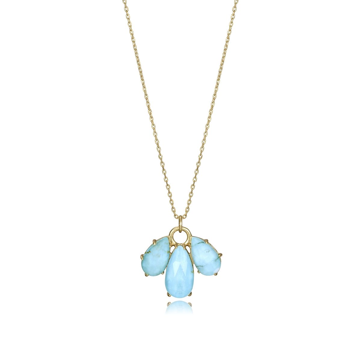 Elegant blue gemstone necklace with teardrop and round stones on a delicate gold chain, perfect for stylish occasions.