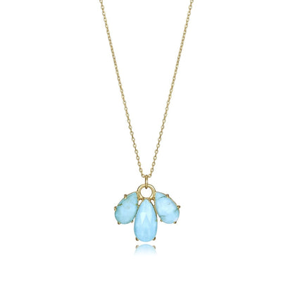 Elegant blue gemstone necklace with teardrop and round stones on a delicate gold chain, perfect for stylish occasions.