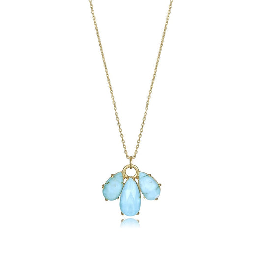Elegant blue gemstone necklace with teardrop and round stones on a delicate gold chain, perfect for stylish occasions.
