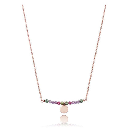 Elegant multicolor beaded necklace with gold accents and central disk pendant on a delicate chain.