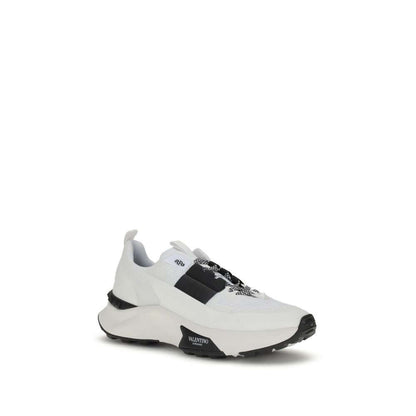 Valentino Garavani White Calf Leather Bos Taurus Athletic Sneakers with mesh upper and studded sole.