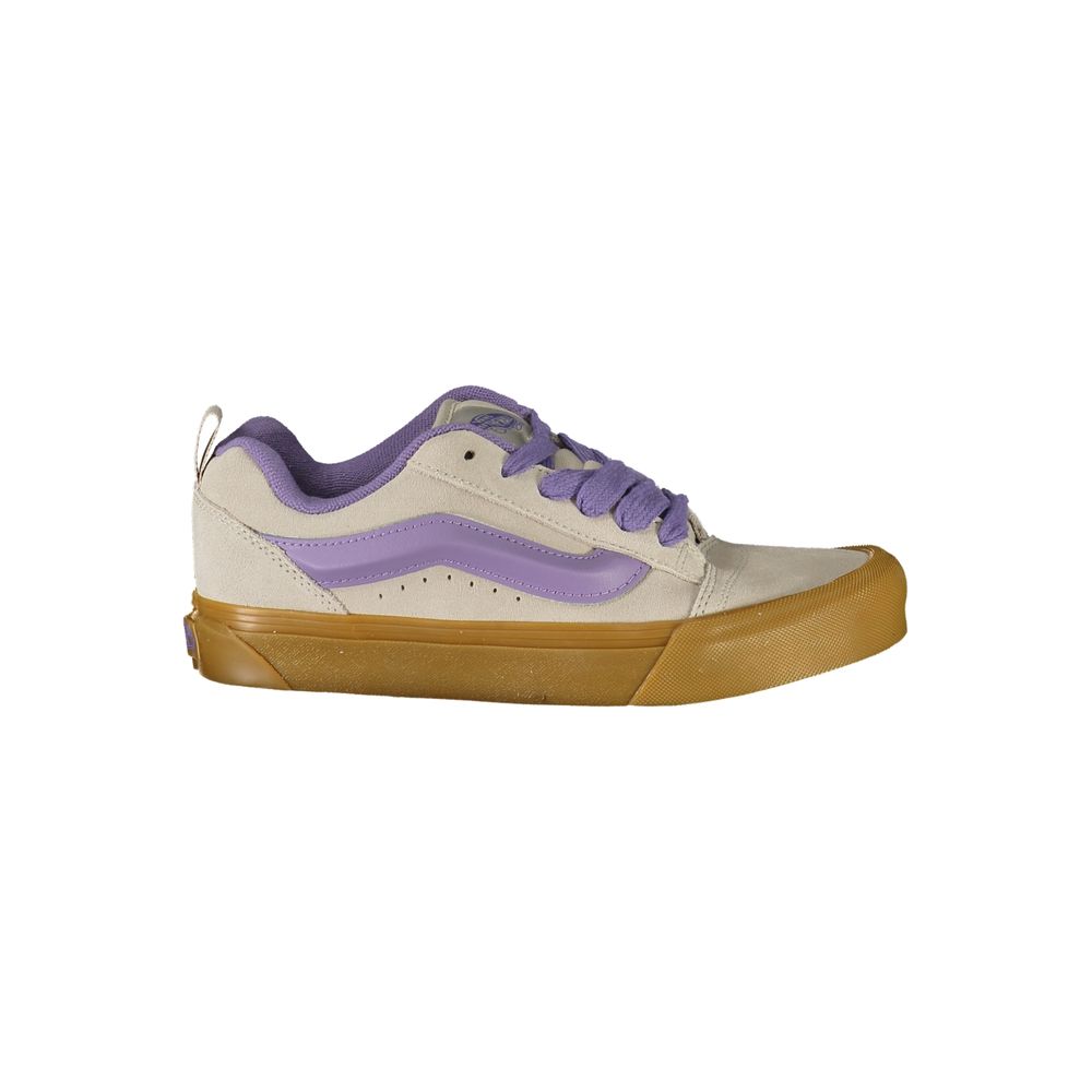 Vans Gray Leather Women Sneaker with Wisteria accents, classic style, and iconic Vans logo. Lace-up design. Elevate your casual look.